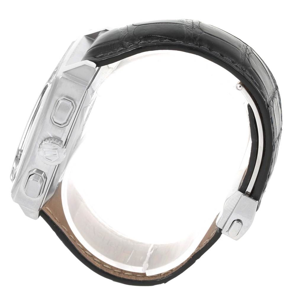 This side view of the Tag Heuer Monaco CW2113 Men
s Stainless Steel Blue Dial CW2113 Men
s Stainless Steel Blue Dial watch shows the case, crown, pushers, and leather strap.