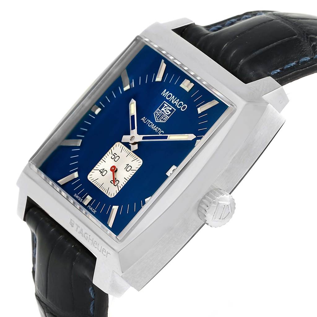 The image shows a Tag Heuer Monaco WW2111 Men's Stainless Steel Blue Dial WW2111 Men's Stainless Steel Blue Dial watch at a slight angle, displaying its blue dial, square case, crown, and part of the leather strap.