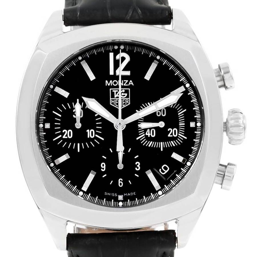 The image shows the front view of a Tag Heuer Monza watch, highlighting its black dial, sub-dials, and bezel.