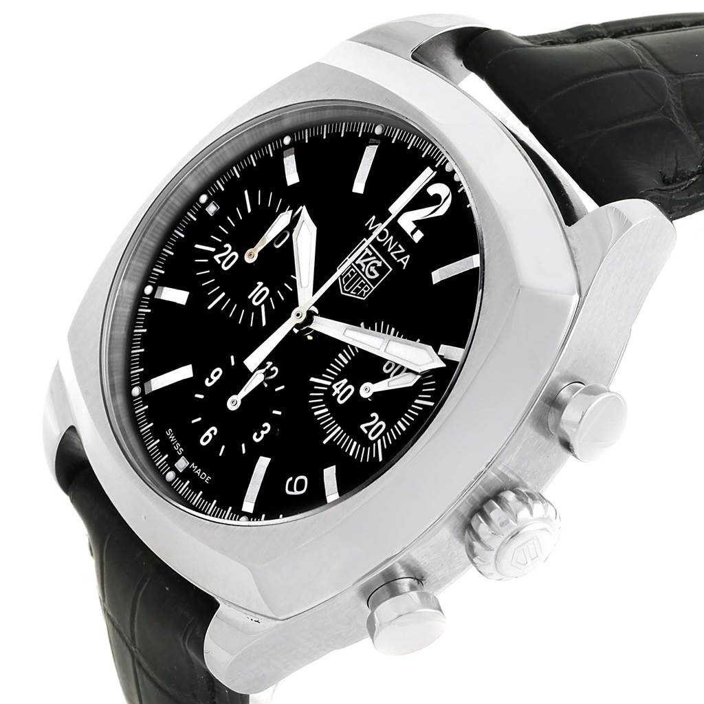 This image shows a Tag Heuer Monza CR2113.FC6164 Men's Stainless Steel Black Dial CR2113.FC6164 Men's Stainless Steel Black Dial watch at an angle, highlighting its black dial, stainless steel case, and black leather strap.