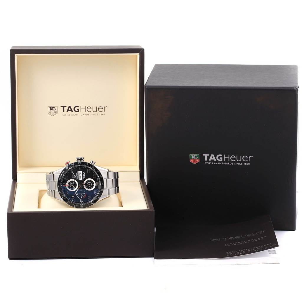 The photo displays a Tag Heuer Carrera CV2A10.BA0796 Men's Stainless Steel Black Dial CV2A10.BA0796 Men's Stainless Steel Black Dial watch, positioned in an open box, with an additional closed box and booklet.