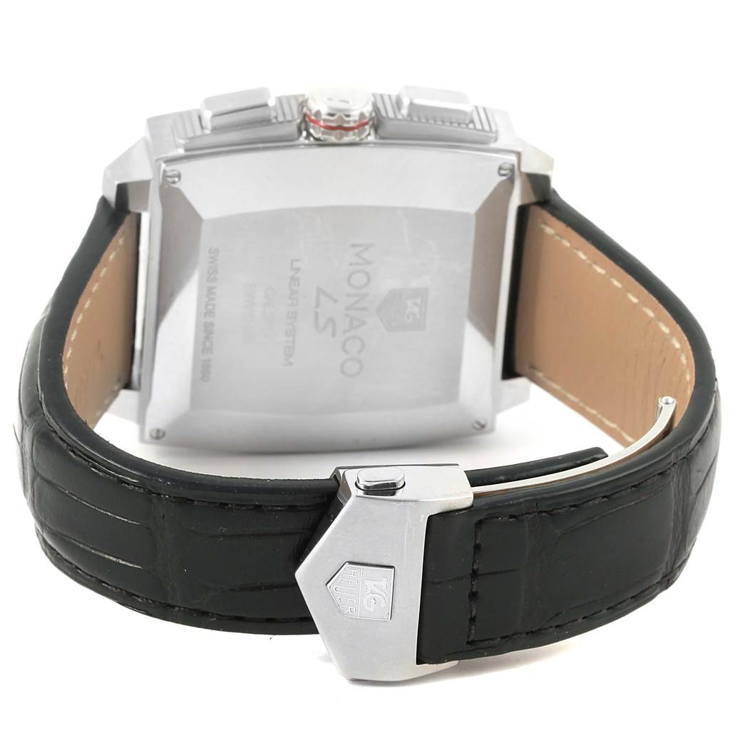 The image shows the back view of a Tag Heuer Monaco CAL2110.FC6257 Men's Stainless Steel Black Dial CAL2110.FC6257 Men's Stainless Steel Black Dial watch, highlighting the clasp, leather strap, and case back.