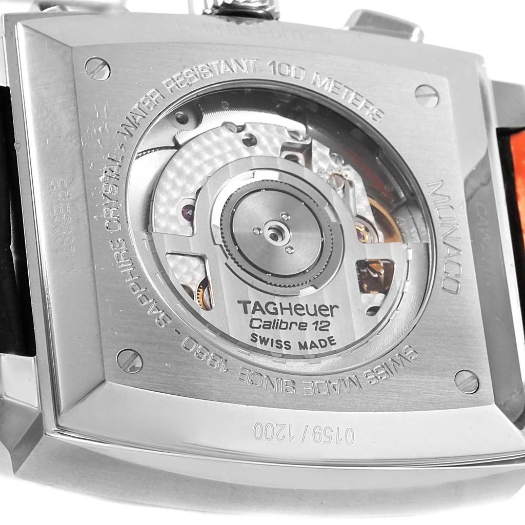 The image shows the back view of a Tag Heuer Monaco Limited Edition watch, showcasing the Calibre 12 movement.