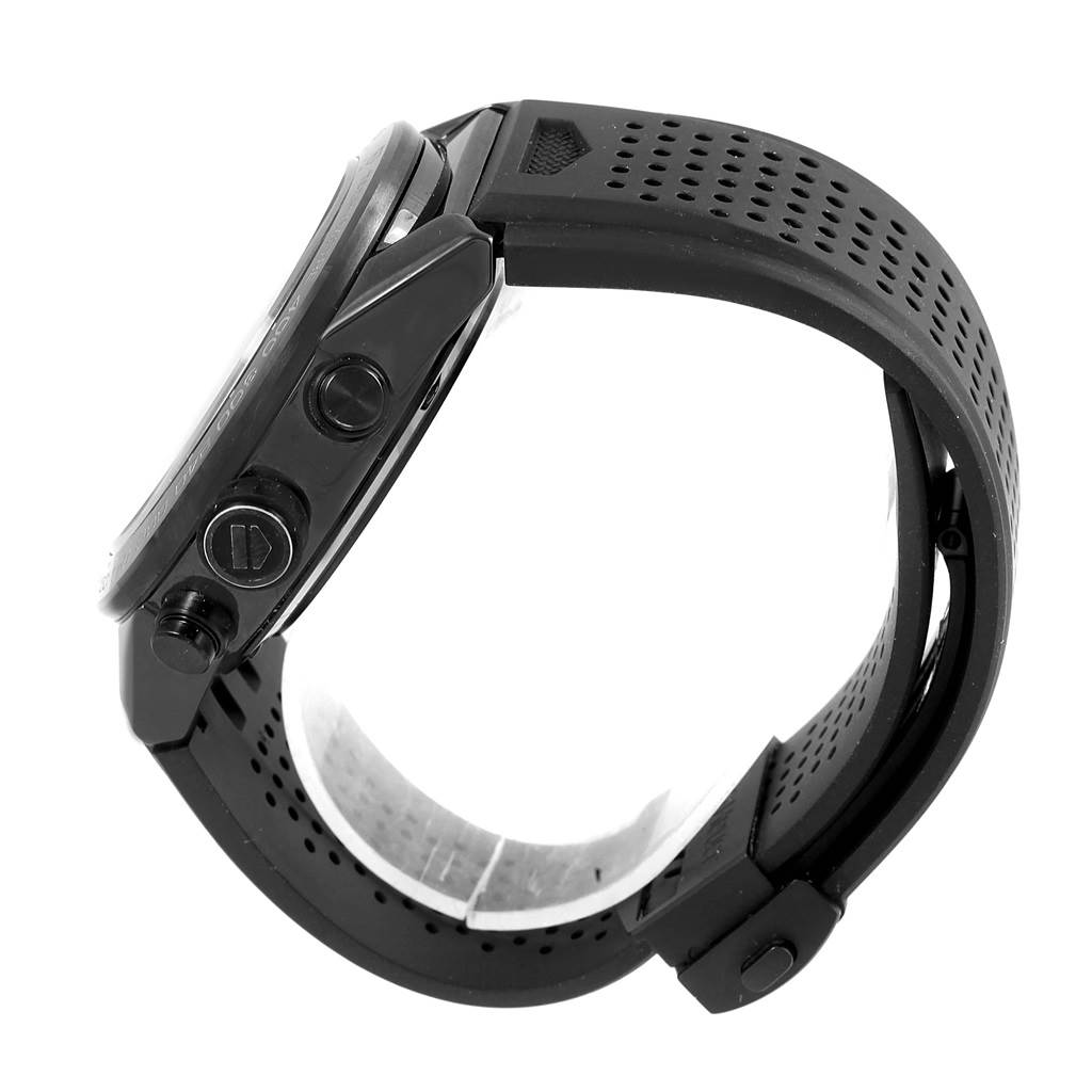 The image shows a side view of a Tag Heuer Carrera CAR2A90.FT6071 Men
s Stainless Steel Black Dial CAR2A90.FT6071 Men
s Stainless Steel Black Dial with a black perforated rubber strap and visible side buttons.