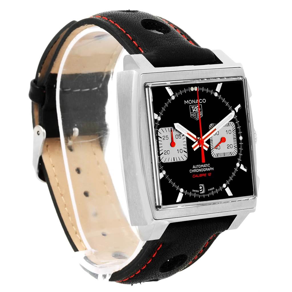 The watch is shown at a three-quarter angle, highlighting the face and black leather strap of the Monaco model by Tag Heuer.