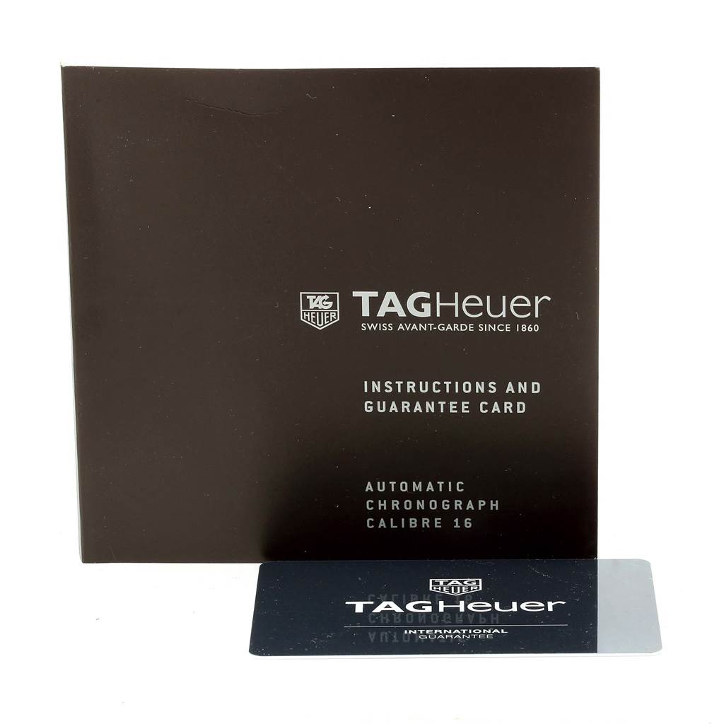 The image shows the instruction manual and guarantee card for the Tag Heuer Formula 1 CAZ2011.FT8024 Men's Titanium Black Dial CAZ2011.FT8024 Men's Titanium Black Dial model watch.