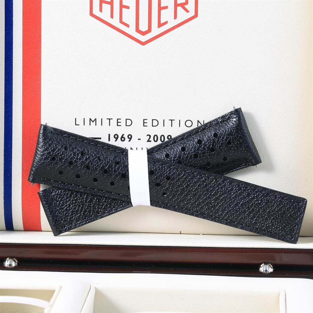 This image features a pair of black leather watch straps for the Tag Heuer Monaco CAW211A.EB0026 Men's Stainless Steel Blue Dial CAW211A.EB0026 Men's Stainless Steel Blue Dial model, displayed against the watch's limited edition packaging.