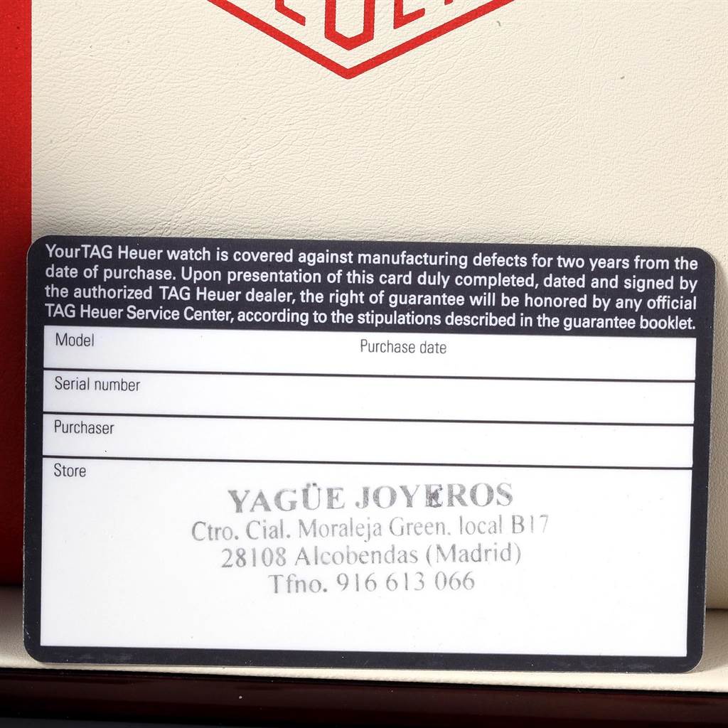 The image shows a guarantee card for a Tag Heuer Monaco CAW211A.EB0026 Men's Stainless Steel Blue Dial CAW211A.EB0026 Men's Stainless Steel Blue Dial model watch, including information fields for model, serial number, purchaser, and store information.