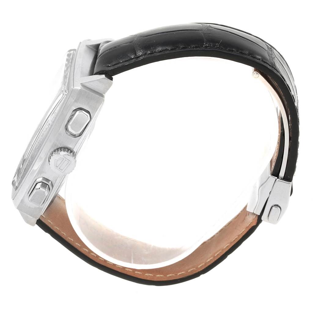 This is a side view of the Tag Heuer Monaco CW2111 Men's Stainless Steel Black Dial CW2111 Men's Stainless Steel Black Dial watch showing its crown, pushers, case, and black leather strap.