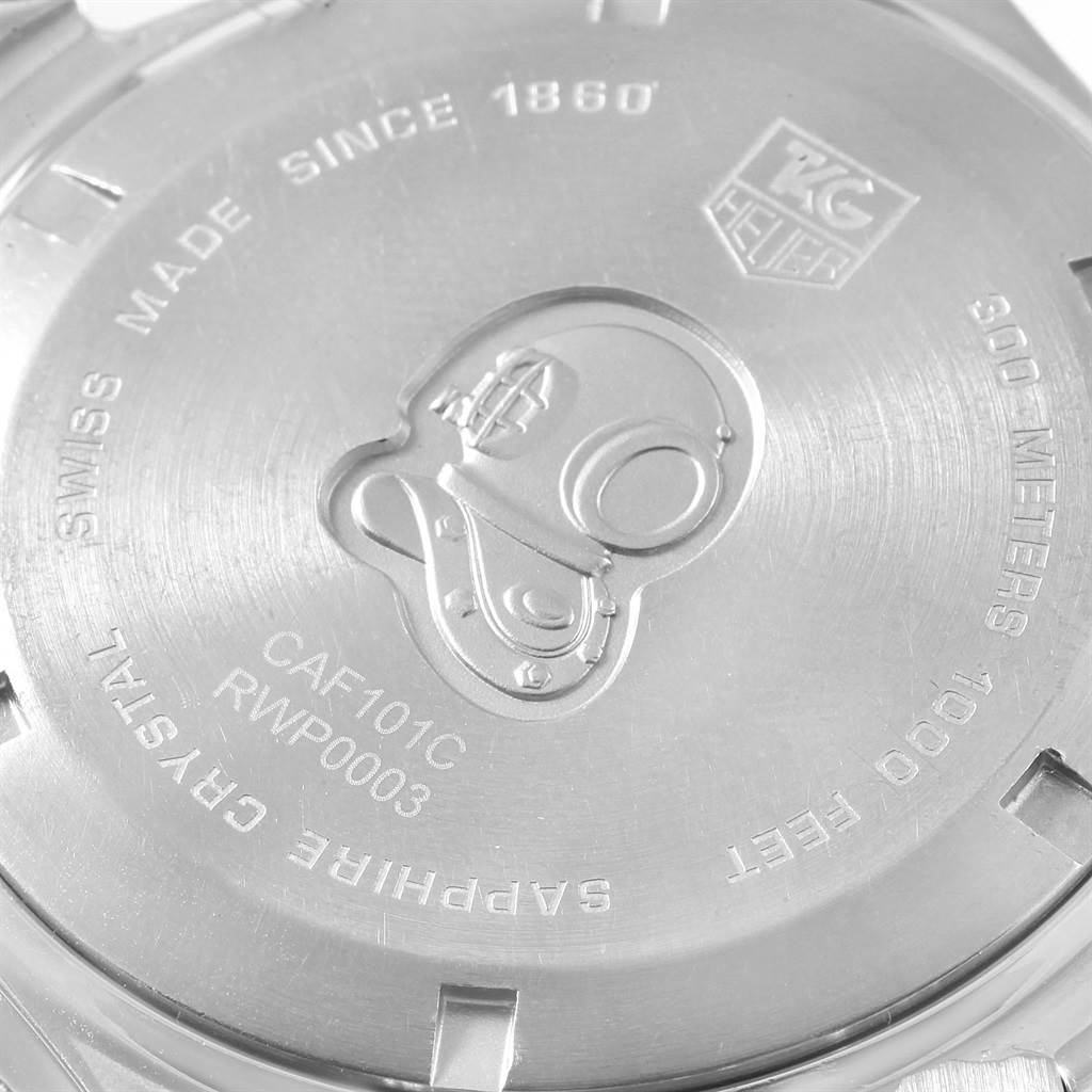 This image shows the back case of the Tag Heuer Aquaracer CAF101C.BA0821 Men's Stainless Steel Blue Dial CAF101C.BA0821 Men's Stainless Steel Blue Dial watch, highlighting its engravings and inscriptions.