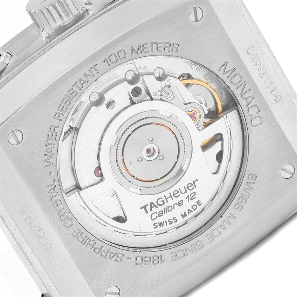 This image shows the back of a Tag Heuer Monaco CAW2111 Men
s Stainless Steel Blue Dial CAW2111 Men
s Stainless Steel Blue Dial watch, highlighting the Calibre 12 mechanism and water resistance details.