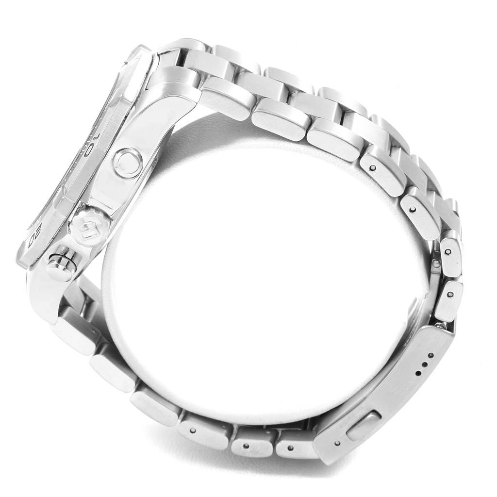 The image shows the side view and metal bracelet of a Tag Heuer Aquaracer CAF101C.BA0821 Men's Stainless Steel Blue Dial CAF101C.BA0821 Men's Stainless Steel Blue Dial watch, highlighting its crown and clasp.