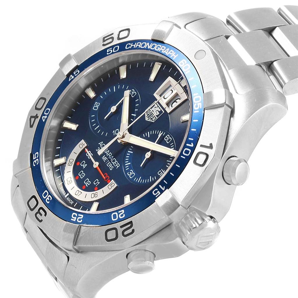 The image shows a close-up, angled view of a Tag Heuer Aquaracer CAF101C.BA0821 Men's Stainless Steel Blue Dial CAF101C.BA0821 Men's Stainless Steel Blue Dial watch, highlighting the bezel, dial, and chronograph buttons.