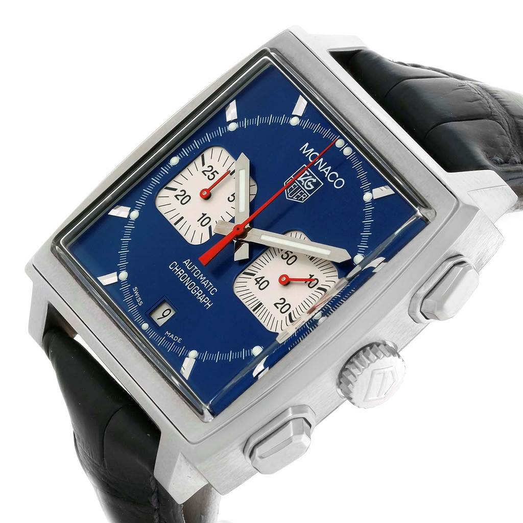 The Tag Heuer Monaco CW2113 Men's Stainless Steel Blue Dial CW2113 Men's Stainless Steel Blue Dial watch is shown from an angle highlighting the face, crown, pushers, and the leather strap.