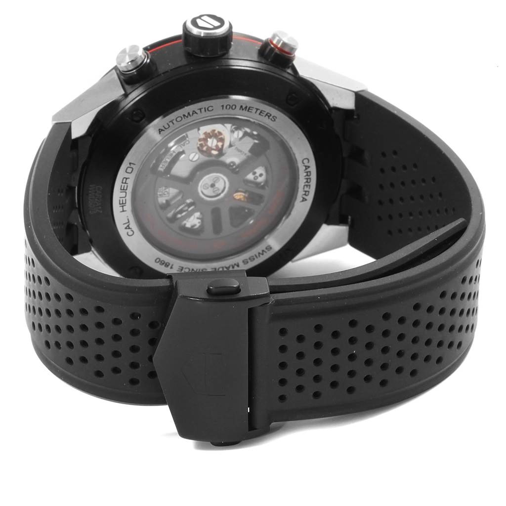 The image shows the back of a Tag Heuer Carrera CAR2A1Z.FT6044 Men's Titanium Black Dial CAR2A1Z.FT6044 Men's Titanium Black Dial watch, highlighting its automatic movement and black perforated strap.