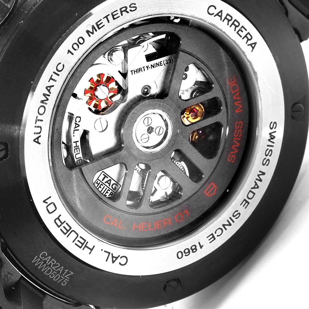 The image shows the back view of a Tag Heuer Carrera CAR2A1Z.FT6044 Men's Titanium Black Dial CAR2A1Z.FT6044 Men's Titanium Black Dial watch, highlighting its automatic movement and intricate internal mechanisms.