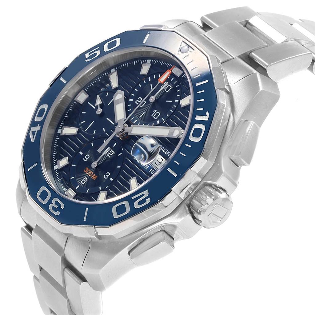 The image shows a side angle view of a Tag Heuer Aquaracer CAY211B.BA0927 Men
s Stainless Steel Blue Dial CAY211B.BA0927 Men
s Stainless Steel Blue Dial watch, highlighting the crown, bezel, and part of the bracelet.