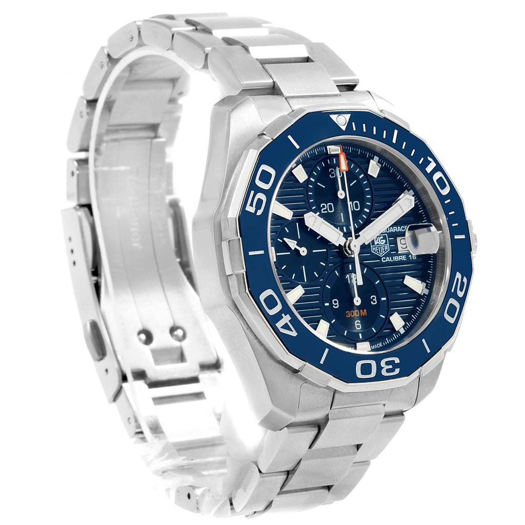 The image shows a side angle view of the Tag Heuer Aquaracer CAY211B.BA0927 Men
s Stainless Steel Blue Dial CAY211B.BA0927 Men
s Stainless Steel Blue Dial watch, displaying its blue dial, bezel, and metal bracelet.