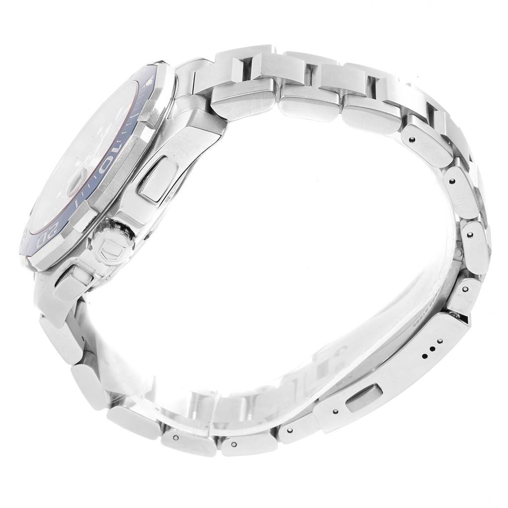 The image shows a side view of the Tag Heuer Aquaracer CAY211B.BA0927 Men
s Stainless Steel Blue Dial CAY211B.BA0927 Men
s Stainless Steel Blue Dial watch, highlighting its case, crown, and metal bracelet.