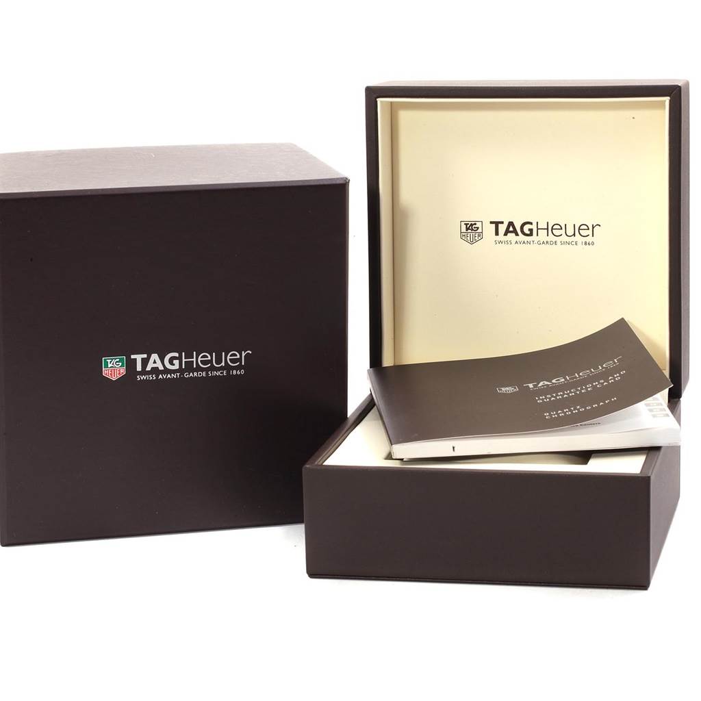 The image shows the packaging and manual for the Tag Heuer Monza CR2113.FC6164 Men's Stainless Steel Black Dial CR2113.FC6164 Men's Stainless Steel Black Dial watch with an open box and booklet inside.