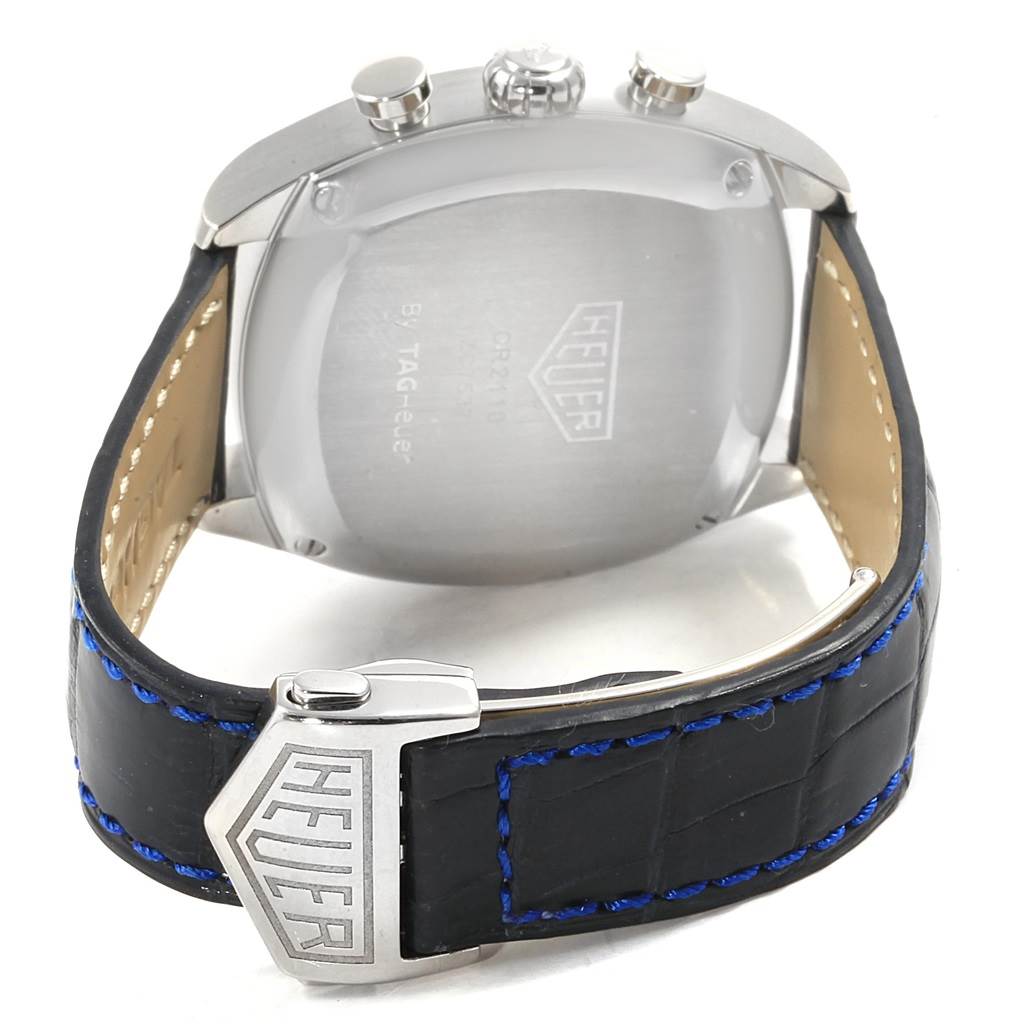 This image shows the back and clasp of a Tag Heuer Monza CR2113.FC6164 Men's Stainless Steel Black Dial CR2113.FC6164 Men's Stainless Steel Black Dial watch, highlighting the stainless steel case and black leather strap.