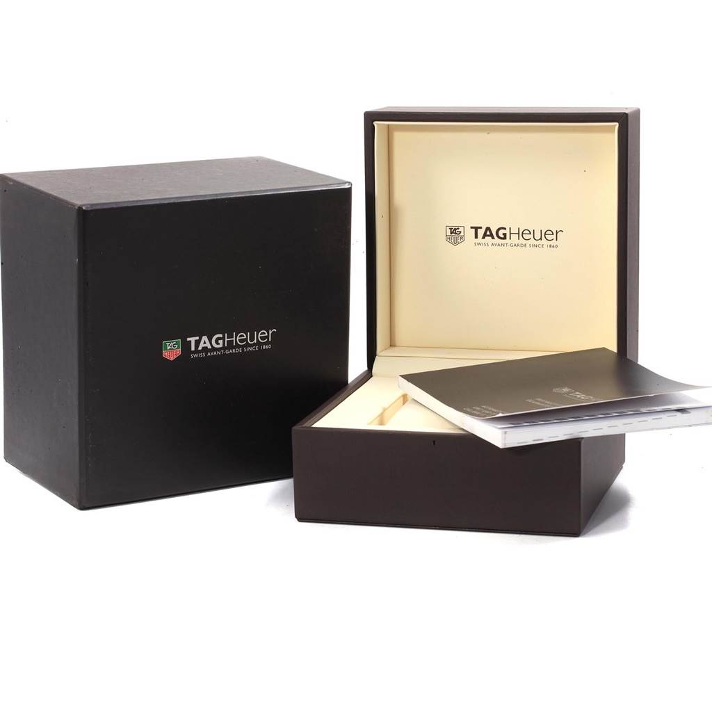 The image shows the packaging and manual for the Tag Heuer Monza CR2113.FC6164 Men's Stainless Steel Black Dial CR2113.FC6164 Men's Stainless Steel Black Dial, with the box open and an outer black box beside it.