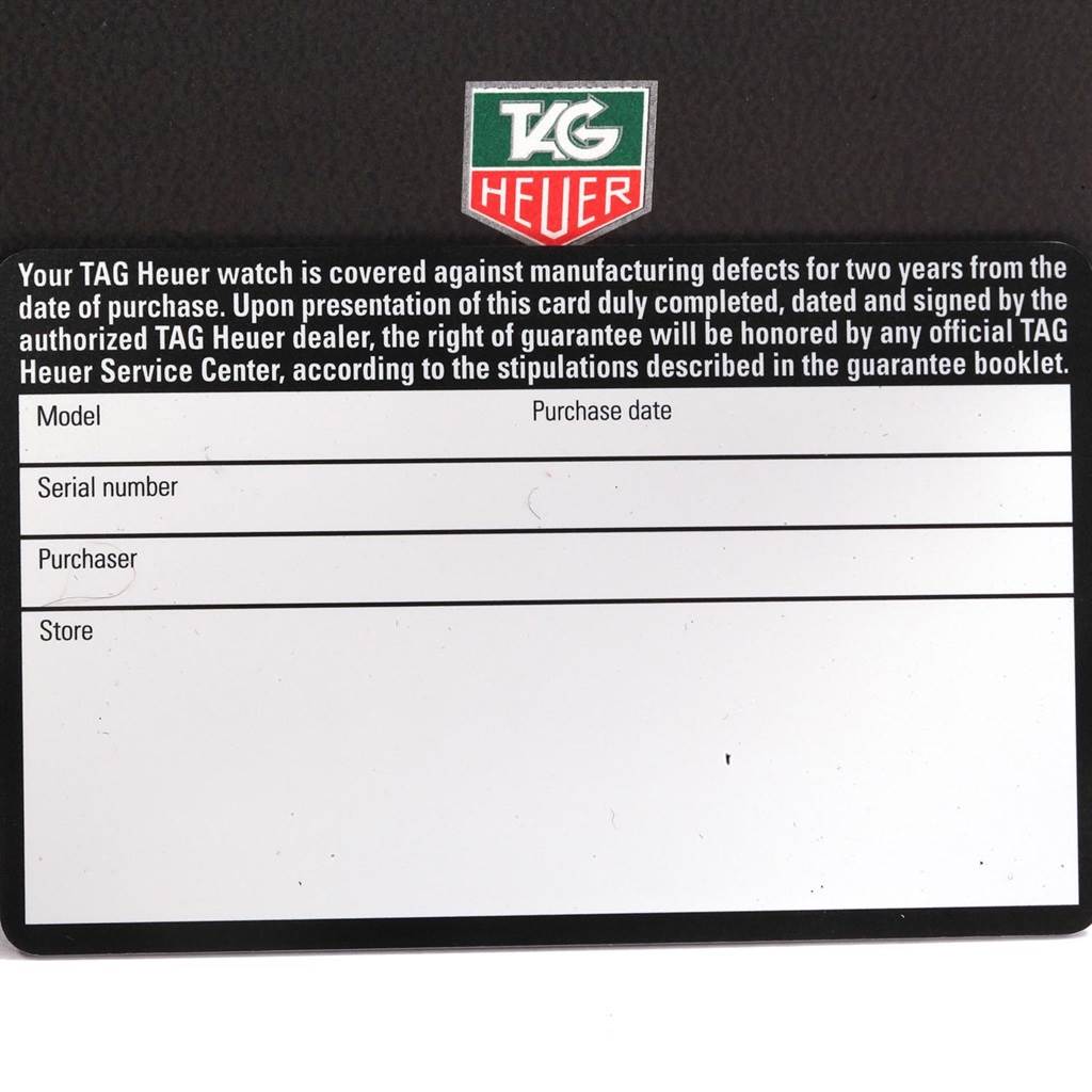 This image shows a blank warranty card for the Tag Heuer Monaco TAG HEUER Men's Stainless Steel Blue Dial TAG HEUER Men's Stainless Steel Blue Dial model watch.