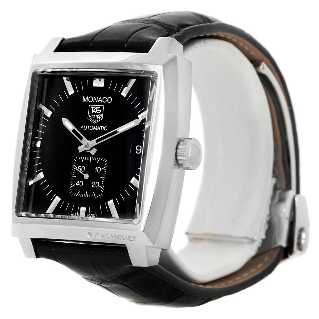 The image shows a Tag Heuer Monaco WW2110 Men's Stainless Steel Black Dial WW2110 Men's Stainless Steel Black Dial watch at a three-quarter angle, highlighting the face, crown, and black leather strap.