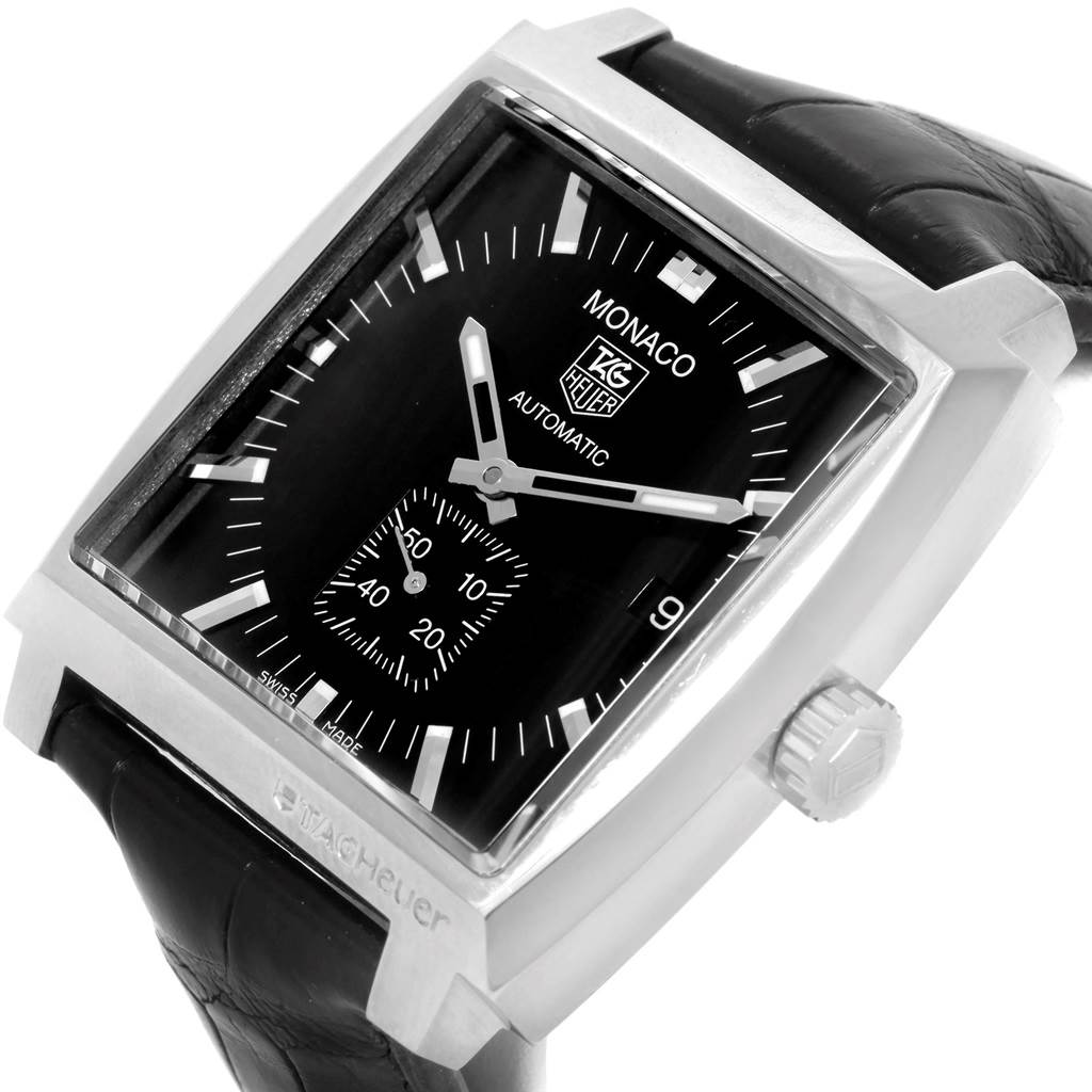 The Tag Heuer Monaco WW2110 Men's Stainless Steel Black Dial WW2110 Men's Stainless Steel Black Dial watch is shown at an angled view, highlighting the square face, crown, and part of the leather strap.