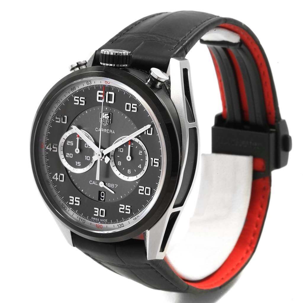 The image shows a Tag Heuer Carrera CAR2C12.FC6327 Men
s Titanium Black Dial CAR2C12.FC6327 Men
s Titanium Black Dial watch from a front angle, highlighting the dial, crown, and black leather strap with red lining.