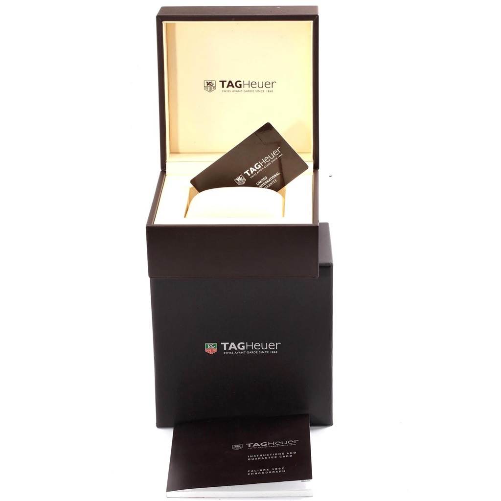 The image shows the open packaging, manual, and warranty card of a Tag Heuer Carrera CAR2C12.FC6327 Men
s Titanium Black Dial CAR2C12.FC6327 Men
s Titanium Black Dial watch.