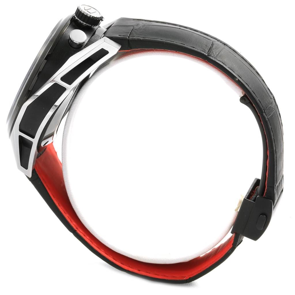 The image shows a side view of the Tag Heuer Carrera CAR2C12.FC6327 Men
s Titanium Black Dial CAR2C12.FC6327 Men
s Titanium Black Dial model watch, highlighting its case, crown, pushers, and leather strap.