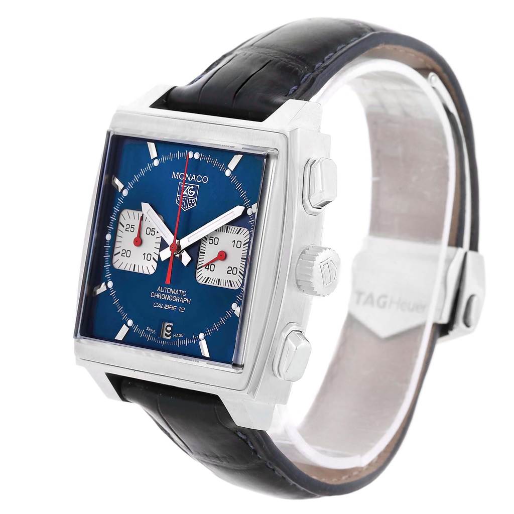 This Tag Heuer Monaco CAW2111 Men
s Stainless Steel Blue Dial CAW2111 Men
s Stainless Steel Blue Dial watch is shown at a slight angle, displaying its square face, blue dial, chronograph buttons, and leather strap.