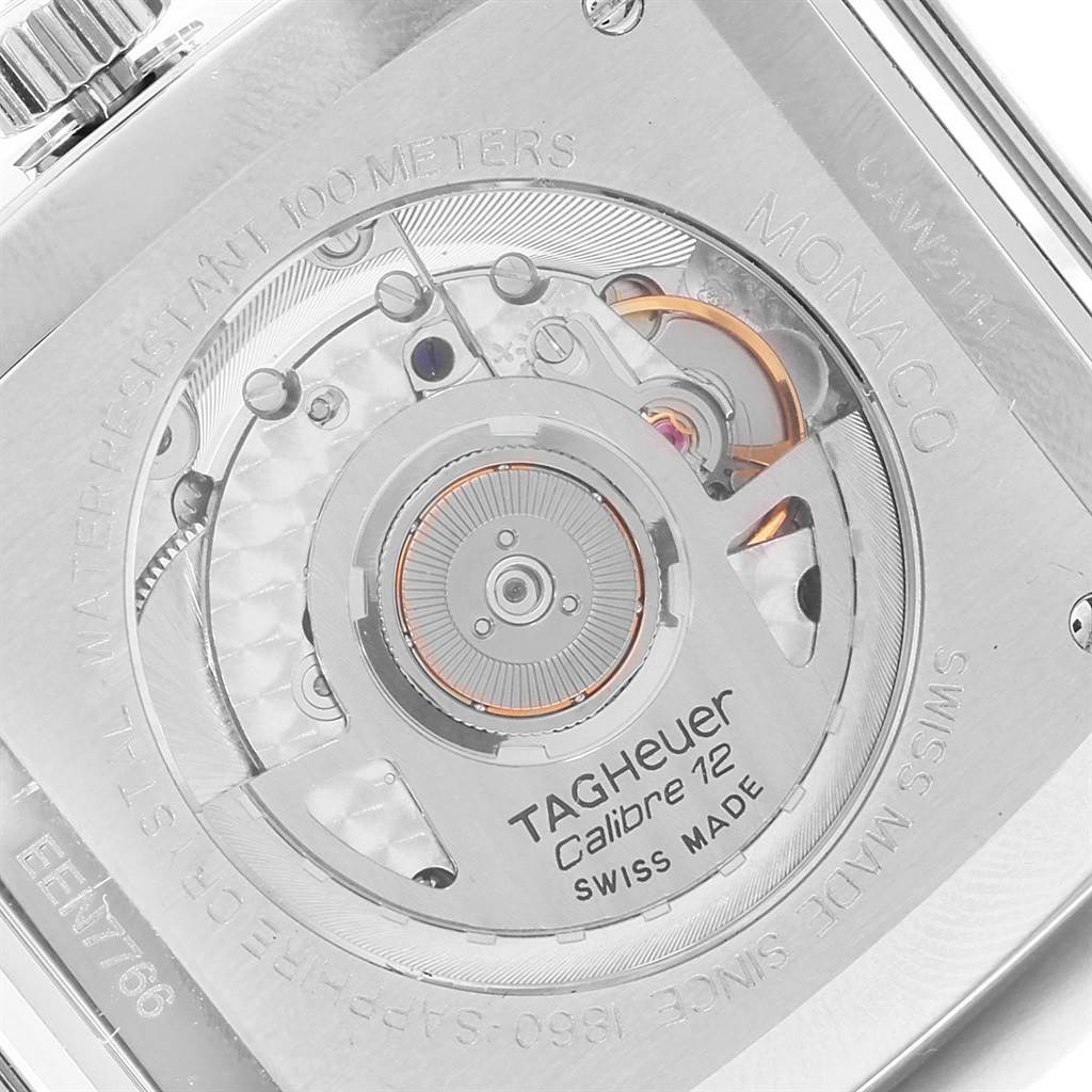 The image shows the case back and movement of a Tag Heuer Monaco CAW2111 Men
s Stainless Steel Blue Dial CAW2111 Men
s Stainless Steel Blue Dial watch at a close-up angle.