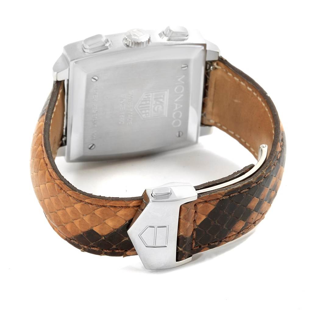 The image shows the back case, crown, pushers, and leather strap of a Tag Heuer Monaco CW2114 Men
s Stainless Steel Brown Dial CW2114 Men
s Stainless Steel Brown Dial watch, viewed from a rear angle.