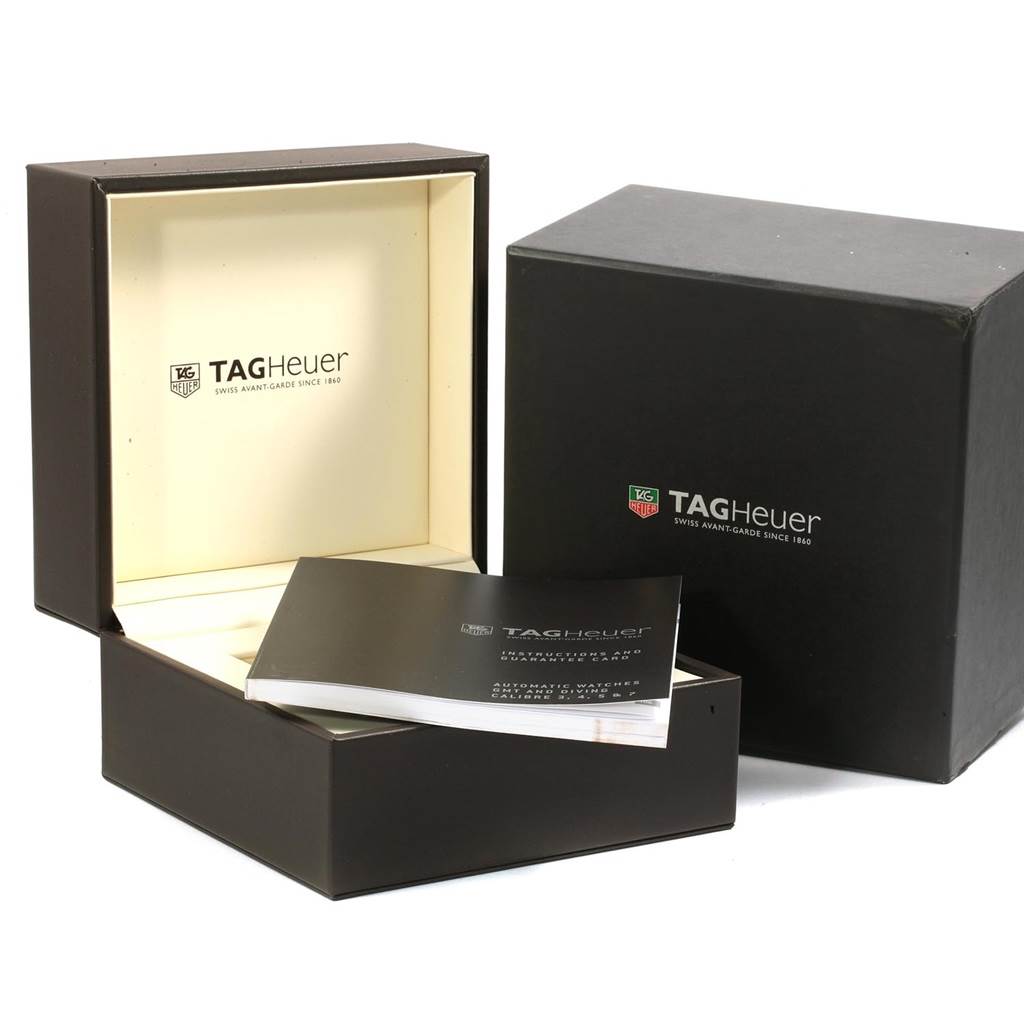 The image shows the open box, outer box, and manual of a Tag Heuer Monaco CW2114 Men
s Stainless Steel Brown Dial CW2114 Men
s Stainless Steel Brown Dial watch.