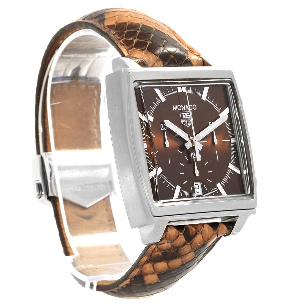 The image shows a side angle view of a Tag Heuer Monaco CW2114 Men
s Stainless Steel Brown Dial CW2114 Men
s Stainless Steel Brown Dial watch with a brown leather strap and a square face.