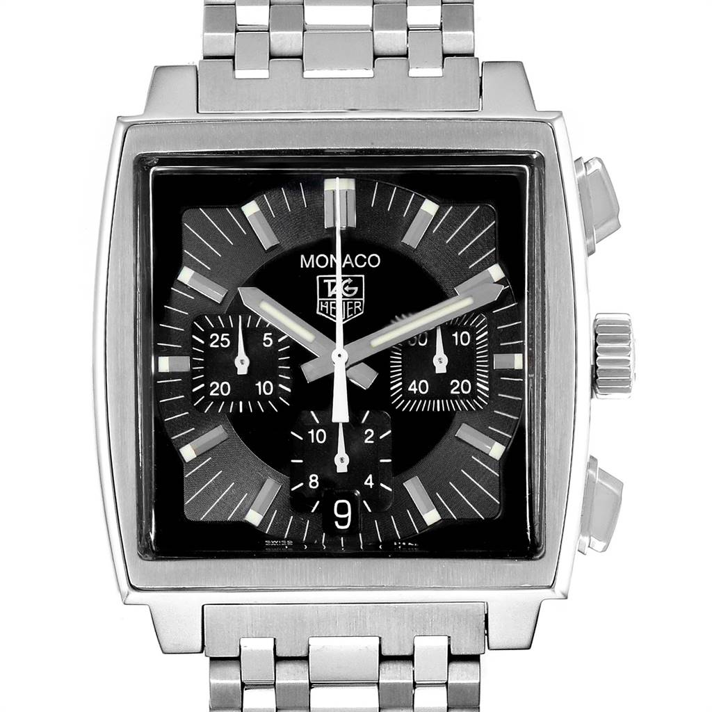 The image shows a front view of the Tag Heuer Monaco CW2111.BA0780 Men's Stainless Steel Black Dial CW2111.BA0780 Men's Stainless Steel Black Dial watch, highlighting the dial, subdials, crown, and part of the bracelet.