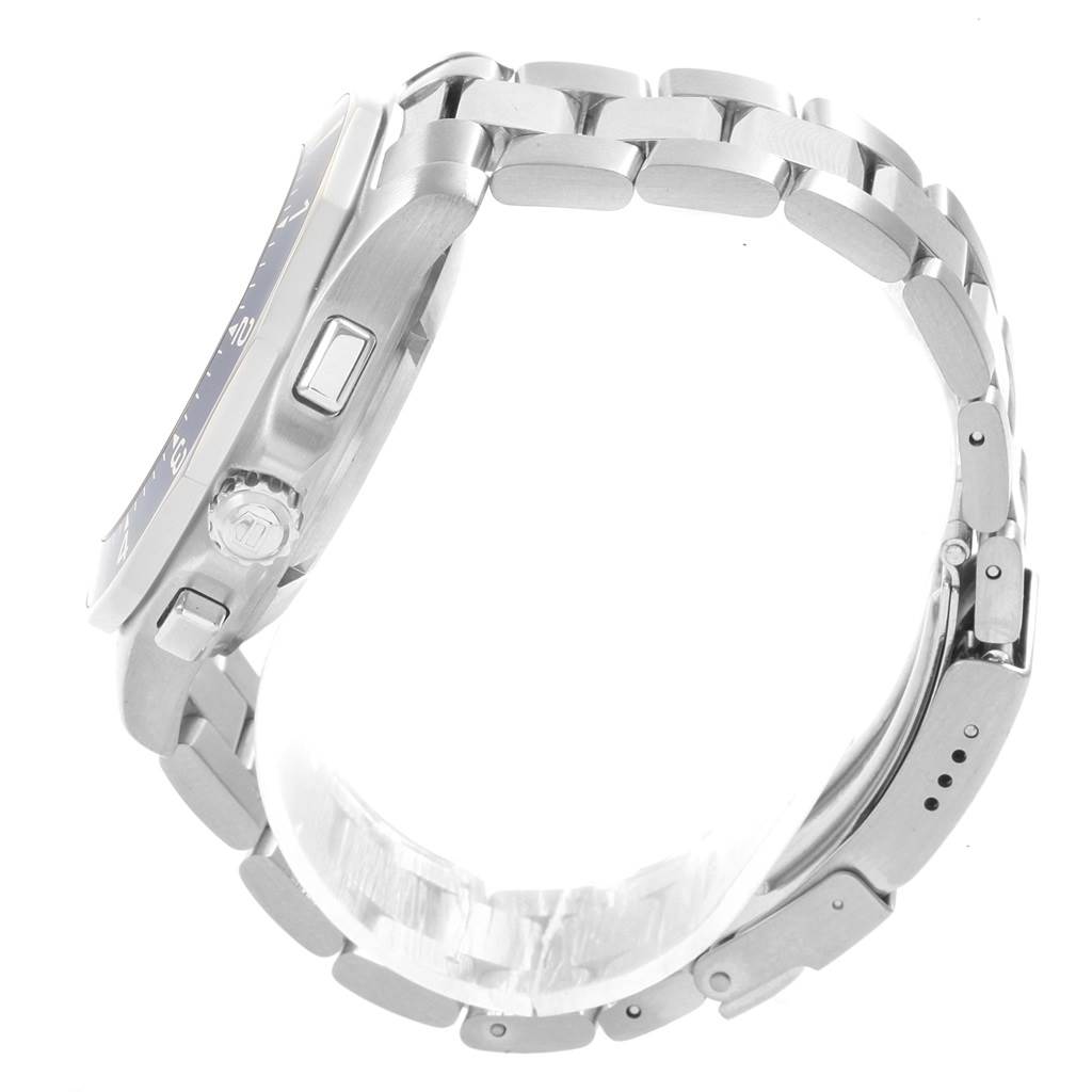 This Tag Heuer Aquaracer CAF7110.BA0803 Men
s Stainless Steel Blue Dial CAF7110.BA0803 Men
s Stainless Steel Blue Dial watch is shown from a side angle highlighting its metal case, crown, and bracelet links.