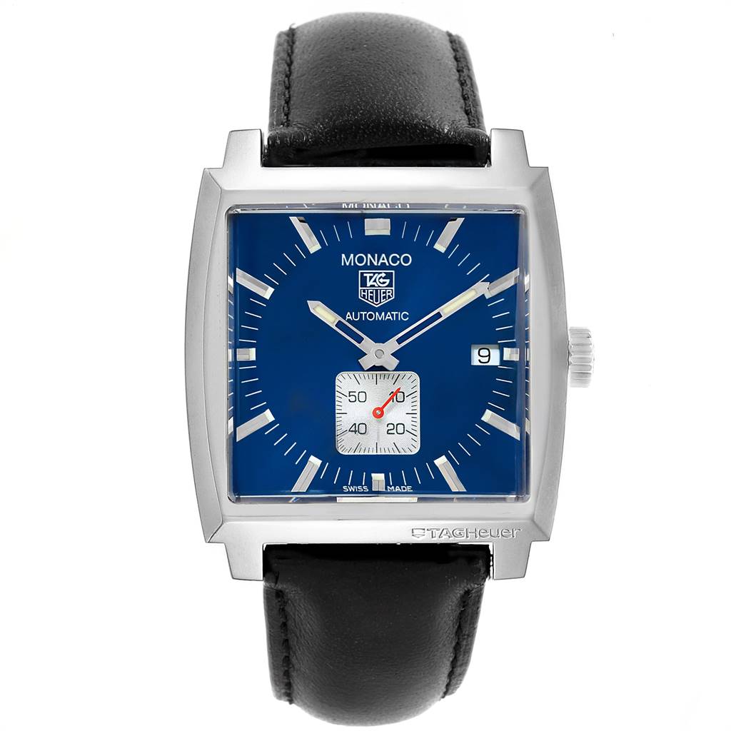 The Monaco by Tag Heuer is shown from a front angle, displaying its blue dial, square case, and black leather strap.