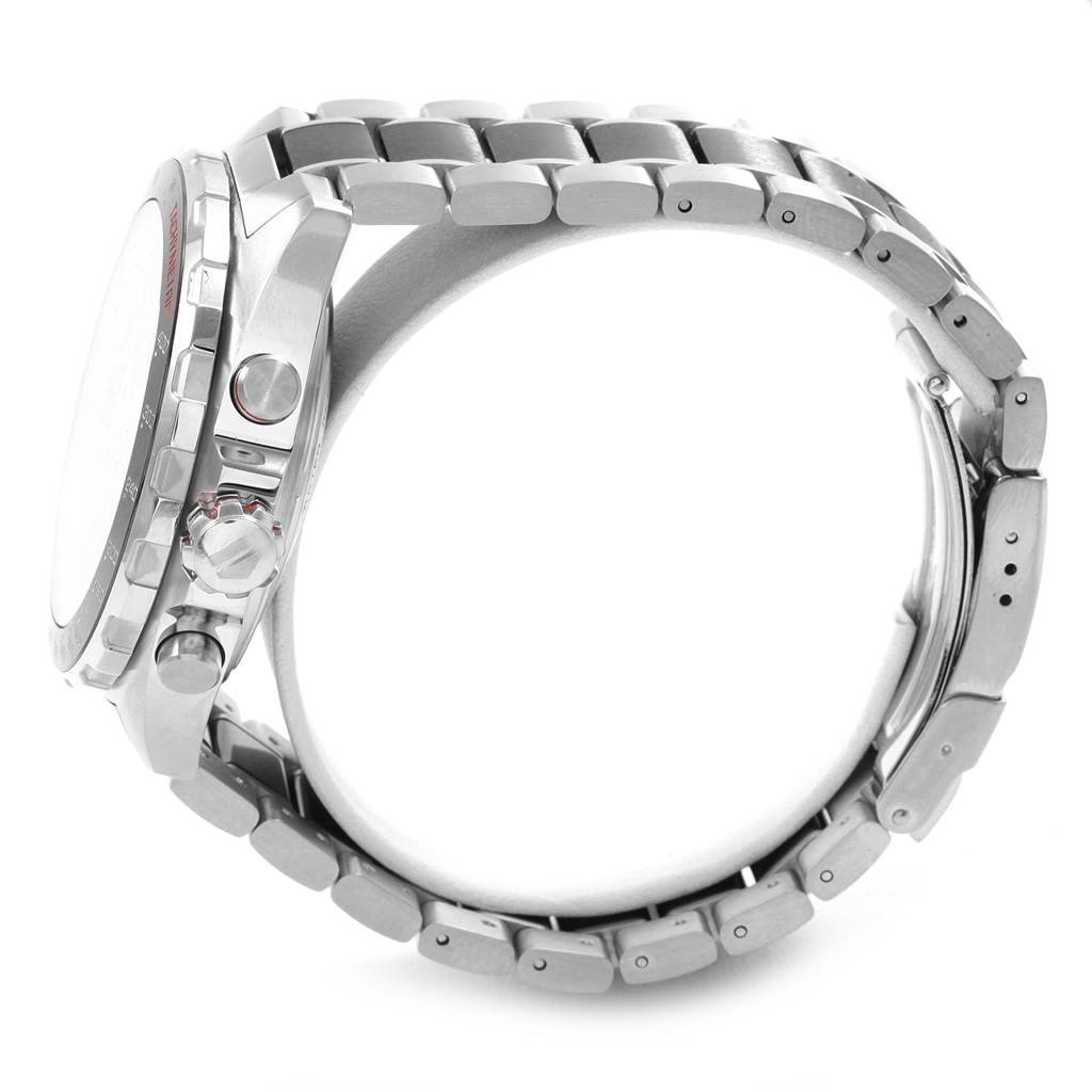 The image displays a side view of the Tag Heuer Formula 1 CAZ2012.BA0970 Men's Stainless Steel Grey Dial CAZ2012.BA0970 Men's Stainless Steel Grey Dial model watch, highlighting the crown, pushers, and part of the metal bracelet.