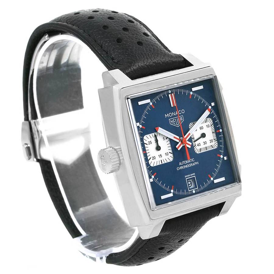 The Tag Heuer Monaco model watch is shown from a side angle, highlighting the face, crown, and strap.