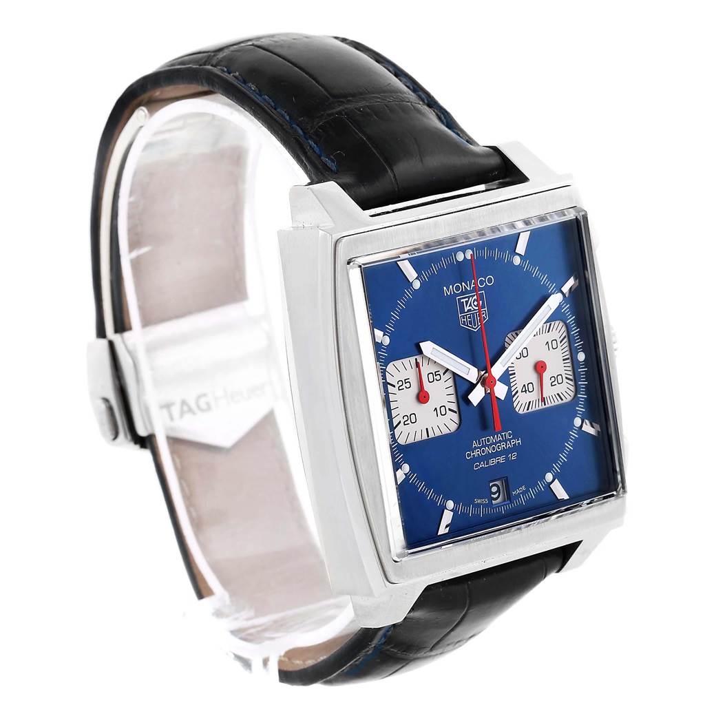 The image shows a side angle of the Tag Heuer Monaco CAW2111 Men's Stainless Steel Blue Dial CAW2111 Men's Stainless Steel Blue Dial watch, highlighting its square face, blue dial, and black leather strap.