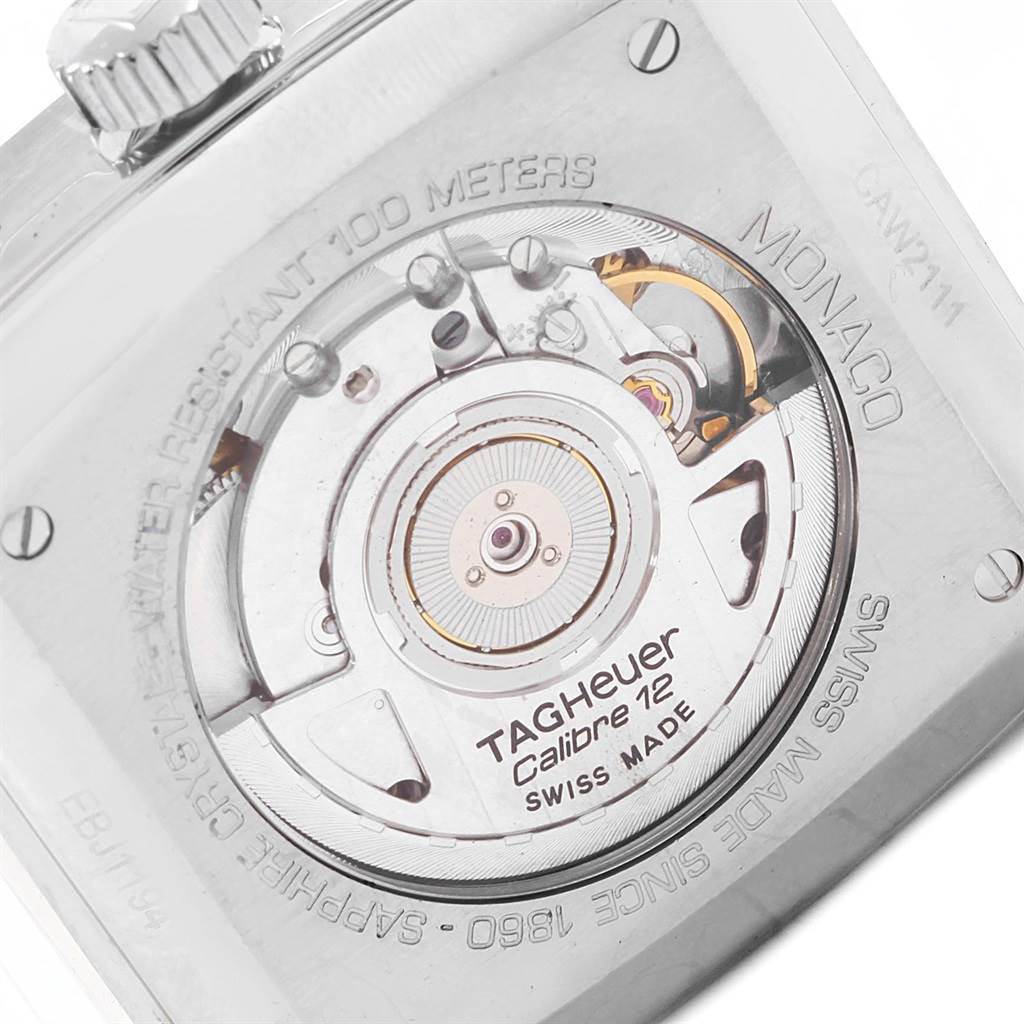 This image shows the back of the Tag Heuer Monaco CAW2111 Men's Stainless Steel Blue Dial CAW2111 Men's Stainless Steel Blue Dial watch, displaying the Calibre 12 movement and engraving details.