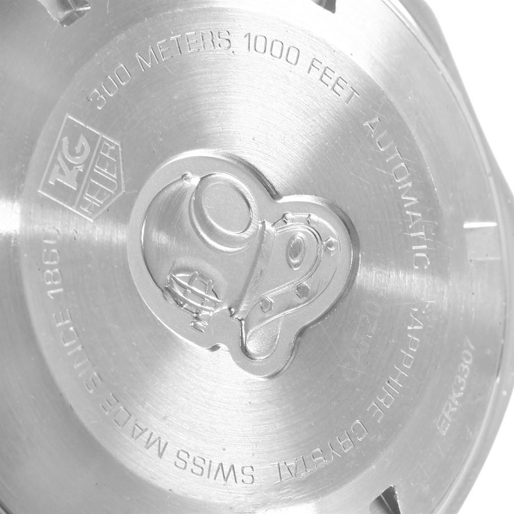 This image shows the back case of the Tag Heuer Aquaracer CAF2010.BA0815 Men's Stainless Steel Black Dial CAF2010.BA0815 Men's Stainless Steel Black Dial watch, featuring engravings and logo details.