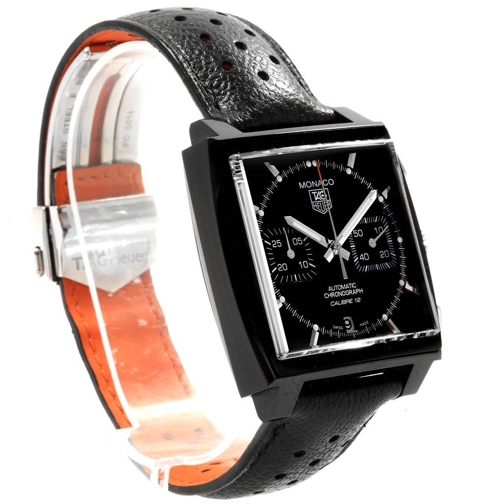 The Tag Heuer Monaco CAW211M.FC6324 Men's Titanium Black Dial CAW211M.FC6324 Men's Titanium Black Dial model watch is shown from an angled front view, highlighting the face and perforated black leather strap.