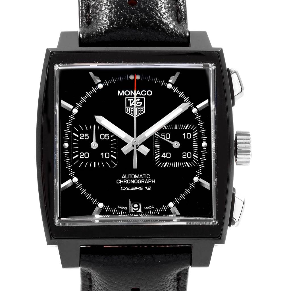 The image shows a frontal view of the Tag Heuer Monaco CAW211M.FC6324 Men's Titanium Black Dial CAW211M.FC6324 Men's Titanium Black Dial watch, highlighting its dial, subdials, and crown.
