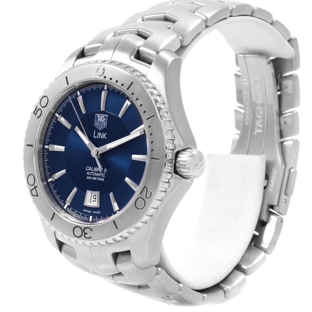 The image shows a Tag Heuer Link WJ201C.BA0591 Men's Stainless Steel Blue Dial WJ201C.BA0591 Men's Stainless Steel Blue Dial watch, angled slightly to display the face, bezel, crown, and part of the bracelet.