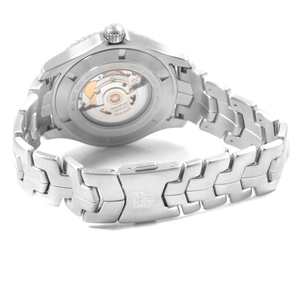 The image shows the back and strap of a Tag Heuer Link WJ201C.BA0591 Men's Stainless Steel Blue Dial WJ201C.BA0591 Men's Stainless Steel Blue Dial model watch, highlighting its clasp and transparent case back.