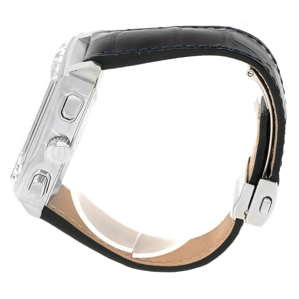 The image shows a side view of the Tag Heuer Monaco CAW2111 Men's Stainless Steel Blue Dial CAW2111 Men's Stainless Steel Blue Dial model watch, highlighting the case, crown, pushers, and leather strap.